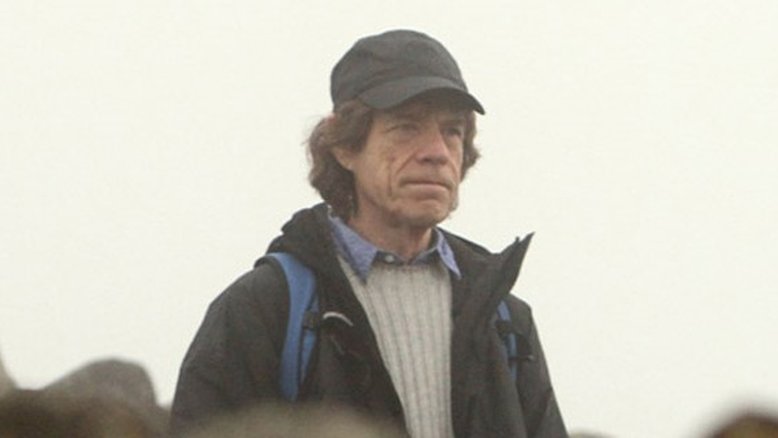 Mick Jagger busca filho na escola