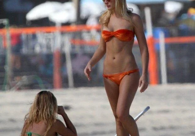 Fiorella Mattheis e Flavio Canto na praia
