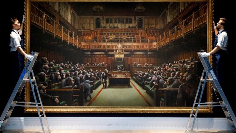 Quadro de Banksy é leiloado por US$ 12 mi, recorde para o artista