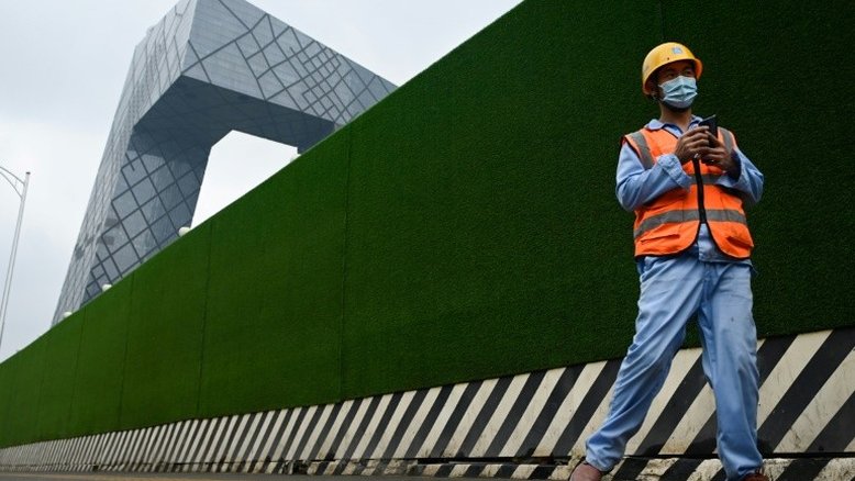 China apoia que OMS avalie a "resposta mundial" à pandemia