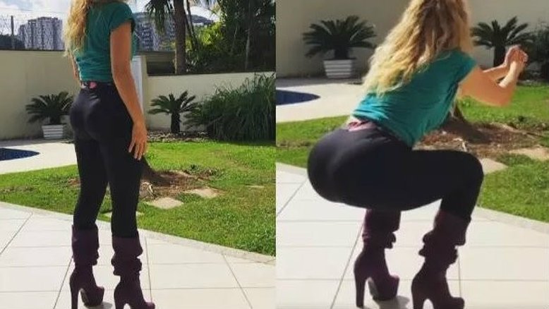 Usando botas de salto alto, Joelma faz exercícios para os glúteos