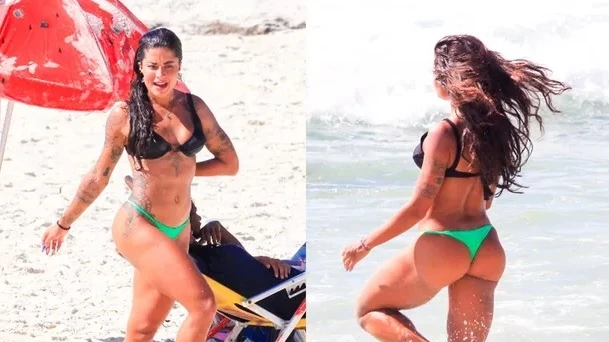 Aline Riscado aproveita verão para se refrescar no mar carioca