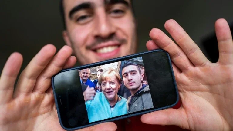 Três vidas transformadas por Merkel