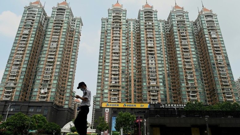 Grupo chinês Evergrande anuncia acordo para evitar default de título importantes