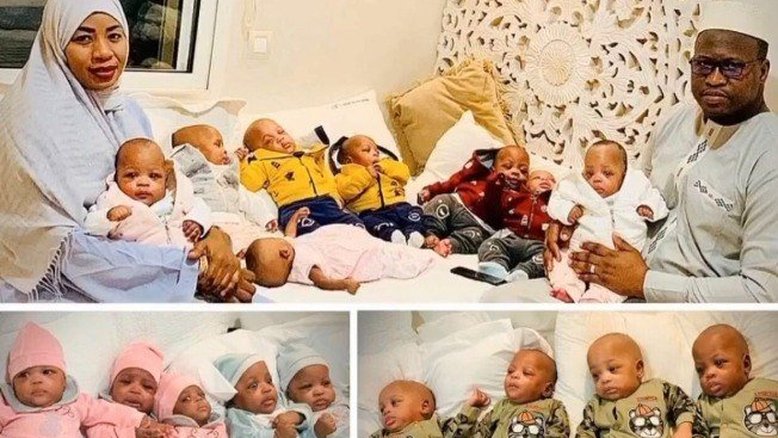 Mulher que deu à luz 9 bebês de uma vez posa com as crianças e o marido
