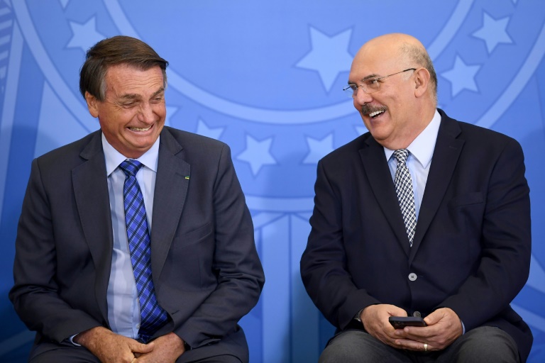 O presidente Jair Bolsonaro e o então ministro da Educação, Milton Ribeiro, em 4 de fevereiro de 2022 no Palácio do Planalto - AFP/Arquivos
