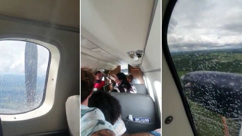 Porta de avião abre durante voo e passageiros seguram cabos para mantê-la fechada