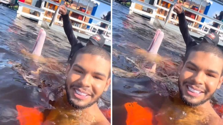 Vyni nadando com o boto