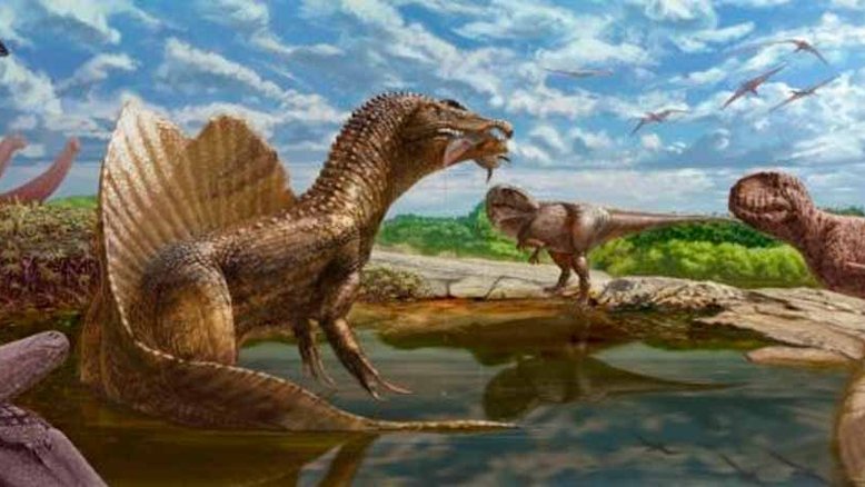 Reconstituição artística do ecossistema do oásis de Bahariya na parte egípcia do deserto do Saara há cerca de 98 milhões de anos, mostrando a diversidade de grandes terópodes (dinossauros predadores). O recém-descoberto abelissaurídeo, ainda sem nome (direita), confronta um espinossauro (centro-esquerda, com peixes nas mandíbulas) e um carcarodontossauro (centro-direita). Ao fundo, uma manada do saurópodes (dinossauro herbívoro gigante de pescoço comprido) paralititan (esquerda) observa cautelosamente esses predadores, enquanto um bando de um pterossauros (réptil voador) ainda sem nome paira acima. Crédito: Andrew McAfee, Museu Carnegie de História Natural