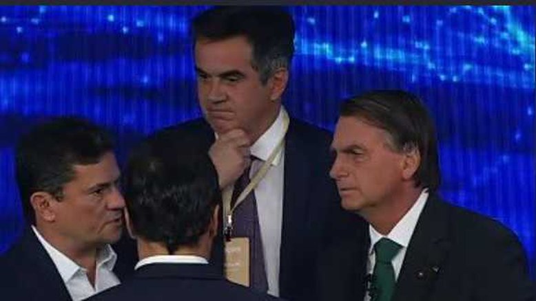 Sergio Moro, Ciro Nogueira e Jair Bolsonaro no debate da Band