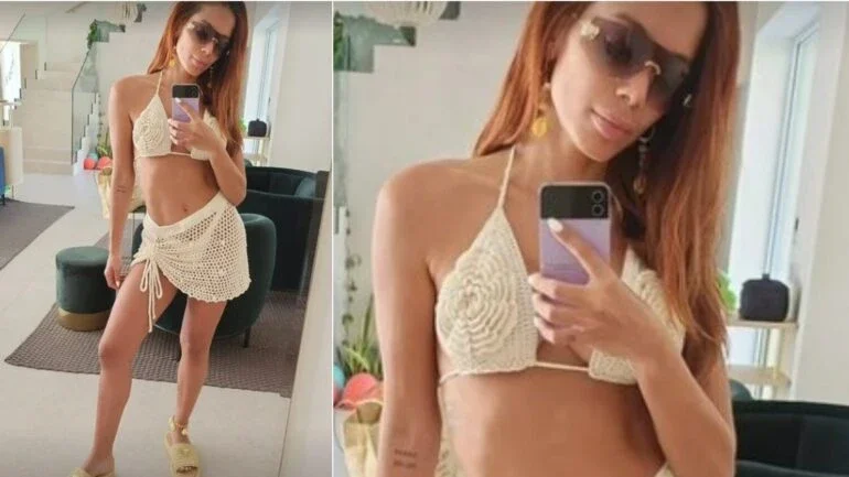 De férias na Europa, Anitta usa chinelo de R$ 7,2 mil em look de praia