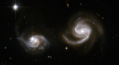 Nesta imagem, vê-se o par de galáxias espirais em interação, com braços giratórios, formado por LEDA 62867 (ou UGC 11415), à esquerda, e NGC 6786, à direita, que provavelmente engolirá a sua vizinha de menores dimensões. Já existe uma perturbação visível em ambos os componentes galácticos, que receberam o número 538, no Catálogo de Pares de Galáxias de Karachentsev. Uma supernova foi identificada na espiral maior, em 2004. NGC 6786 está localizada na Constelação de Draco (“O Dragão”), a cerca de 350 milhões de anos-luz de distância