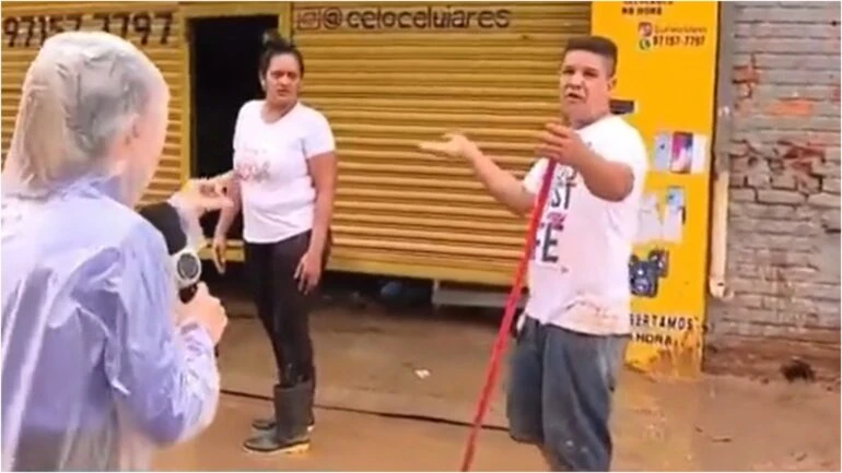 Homem joga lama e discute com repórter da Record TV durante transmissão ao vivo
