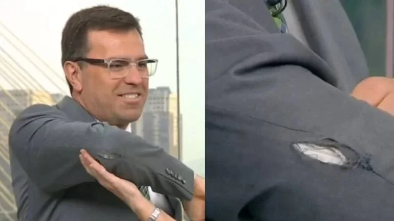 Rodrigo Bocardi aparece com terno rasgado ao vivo no 