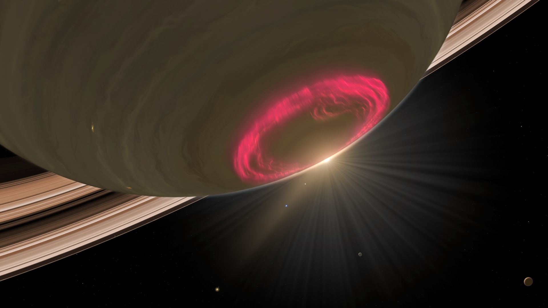 As auroras de Saturno foram observadas, pela primeira vez, em 1979. Décadas mais tarde, estas faixas cintilantes de luz ainda fascinam. Elas são magnificamente altas, elevando-se centenas de quilômetros acima dos polos do planeta. Ao contrário do que acontece na Terra, onde as imagens brilhantes desaparecem após apenas algumas horas, as auroras em Saturno podem brilhar durante dias. Auroras são produzidas quando partículas em alta velocidade, aceleradas pela energia do Sol, colidem com gases na atmosfera de um planeta. Os gases fluorescem, emitindo flashes de luz em diferentes comprimentos de onda