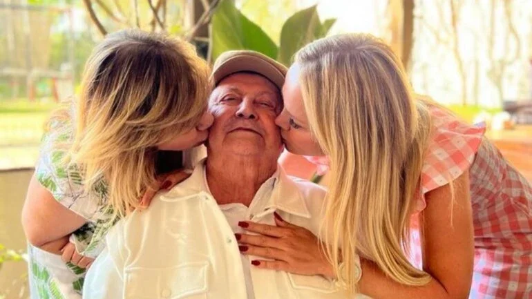 Eliana com o pai e a irmã