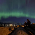 Fotos: auroras boreais são registradas em vários países após tempestade solar