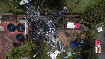 Marcas deixadas pela queda do voo 2283 da Voepass, em Vinhedo (SP) | Nelson Almeida/AFP