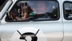 O alemão Jochen Mass senta-se no cockpit de sua Mercedes na largada da corrida histórica de resistência "Mille Miglia", para carros clássicos e antigos, em Brescia, Itália, quinta-feira, 15 de maio de 2014