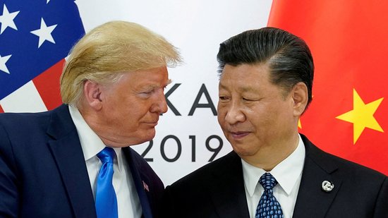 FILE PHOTO: Trump meets Xi at the G20 leaders summit in Osaka, Japan