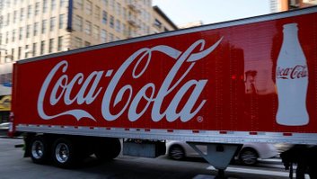 FILE PHOTO: A Coca-Cola truck makes its way through downtown Los Angeles