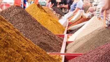 Spices on the eastern market. Mountains of spices on the counter. Oriental Bazaar