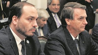 Jair Bolsonaro e Carlos, o '03'
