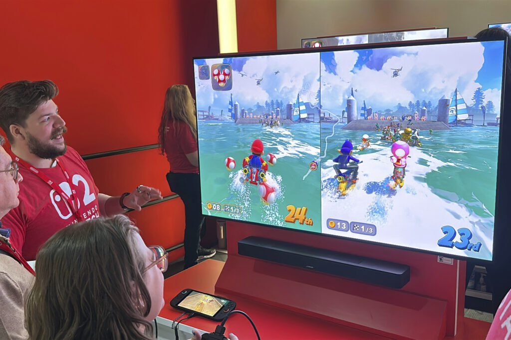 Vale a pena comprar um Nintendo Switch 2? 7 Pessoas jogando Mario Kart World para Nintendo Switch 2