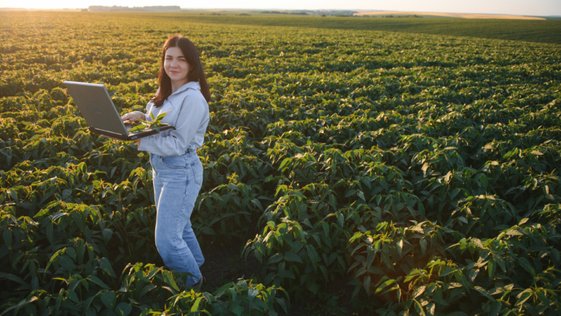pretty-young-agronomist-holding-tablet-and-soybean-2025-03-16-20-53-17-utc-1-770x433