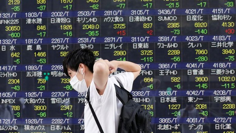 Ações do Japão recuam com temores sobre Evergrande; índice de HK sai de mínima em 1 ano