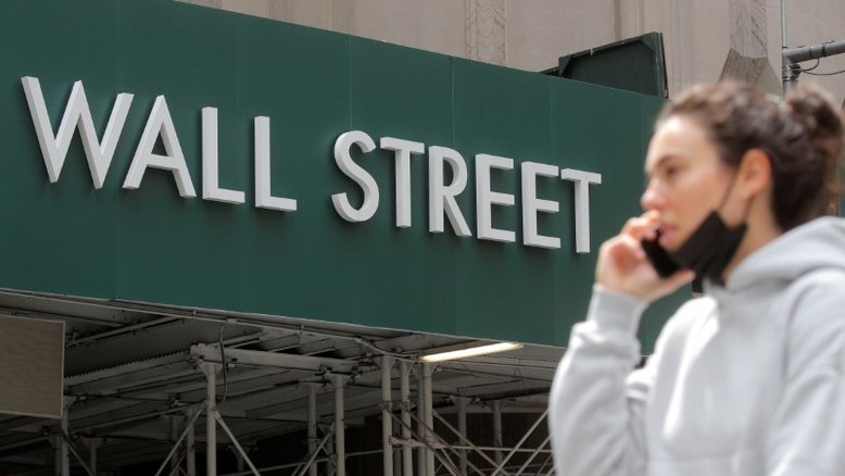 Dow cai mais de 1% após comentários "hawkish" de Bullard
