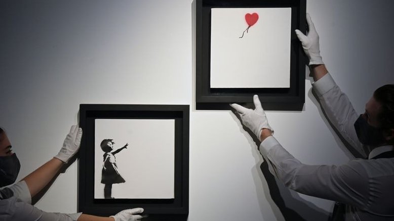 "Menina com balão" de Banksy vai a leilão pela primeira vez