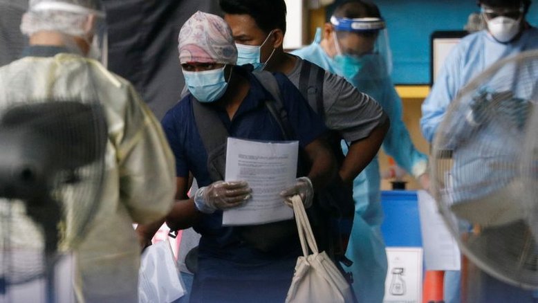 Covid-19 é alerta para encerrar discriminação de trabalhadores imigrantes, dizem ativistas