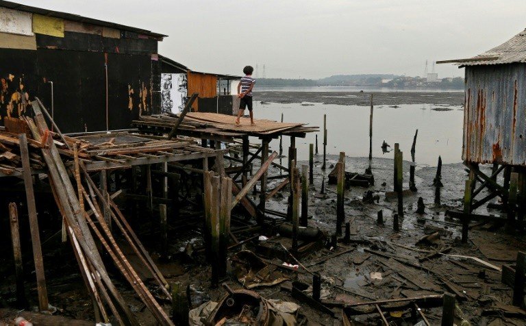 Na maior favela de palafitas do Brasil, a covid é mais uma mazela Na maior favela de palafitas do Brasil, a covid é mais uma mazela